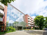 Living Hotel Weißensee Отели рядом с достопримечательностью «Ледовая арена Wellblechpalast»