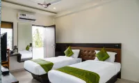Treebo Malhaar Regency Hotels near Moraya Mobile Shopee