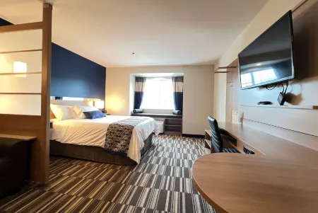 Microtel Inn & Suites by Wyndham Woodland Park Отели в г. Дивайд
