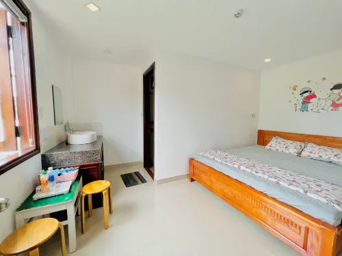 Phòng một giường, có Ban công, chổ đậu xe ô tô - Kenpia Homestay Hotel di Thủy Thanh