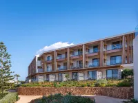 Isla Brown Chania Resort, Curio Collection by Hilton فنادق في Kalathas