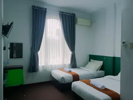 Quanza Hotel Отели в г. Meunasah Papeun