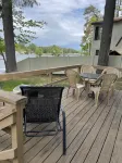 Lakefront Winnisquam Cottage with dock & boat ramp