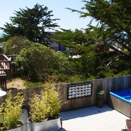 Charming modern bungalow w/ hot tub steps away from the beach