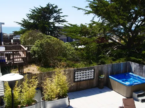 Charming modern bungalow w/ hot tub steps away from the beach
