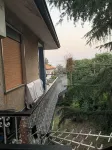 Single villa with large garden and covered parking