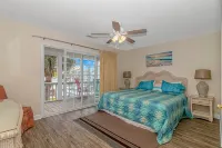 Steps to the beach/ Pool/  Ensuite bathrooms /Arcade/ beautiful safe community Hotels near Surfside Coin Laundry