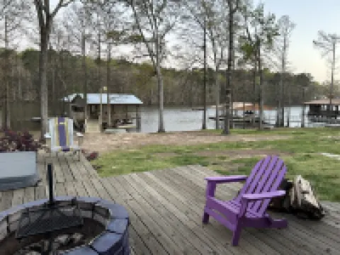 Waterfront house with boathouse, boat launch, outdoor kitchen, fire pit
