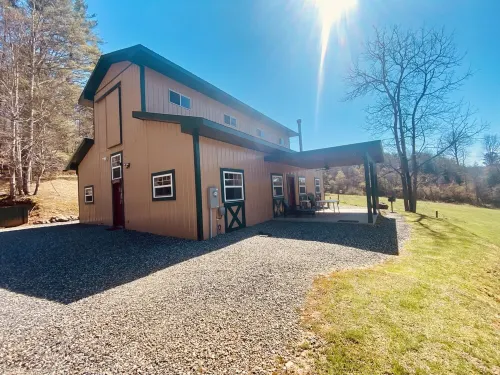 Beautifully renovated Horse Stable on 14 mountain acres walking distance to town