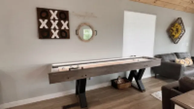 SHORT WALK TO WATER & NESTLED IN THE TREES THIS BEAUTIFUL CABIN HAS LAKE VIEWS