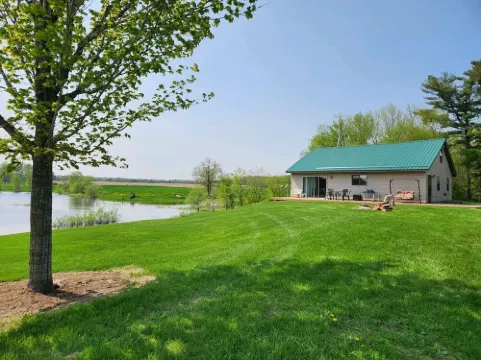 Peacefully secluded cabin on a small private lake with 55 Acres