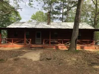 Lakefront rustic log cabin. Any season vacation, get away, or retreat.