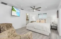 STUNNING!! LUXURY WATERFRONT HOME - HEATED POOL- Close to Harbor/Fish Village
