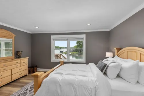 Hot Tub - Remodeled Canadian Lakes lakefront home with breathtaking sunsets!