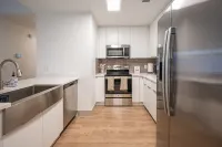 Stylish quarters in the heart of Uptown near stadiums, parks, & offices.