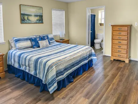 Waterfront, gorgeous sunsets, sandy beach, dogs allowed.