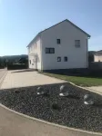 15 Minuten vom Freizeitpark und Seen Entfernt. Ferienwohnung in Ruhiger Lage