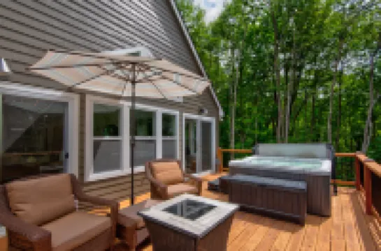 Spacious Living and Relaxing Hot Tub Views - Stunning Mountain Retreat