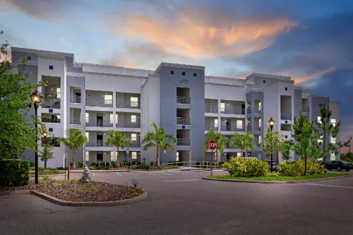 Resort Amenities and Covered Balcony Retreat - Charming Oasis Hotels in Osceola County