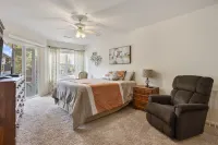 Access to Pools and Wet Bar Retreat - Charming Waterfront Haven