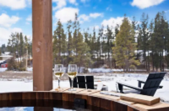 Soaking Tub and Cozy Fireplace - Inviting Rustic Retreat