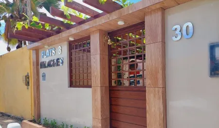 Flats Três Milagres-Pousada Отели рядом с достопримечательностью «Praia do Toque»