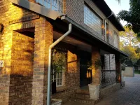 Falling Feather Inn Hotels near Waltloo Train Station