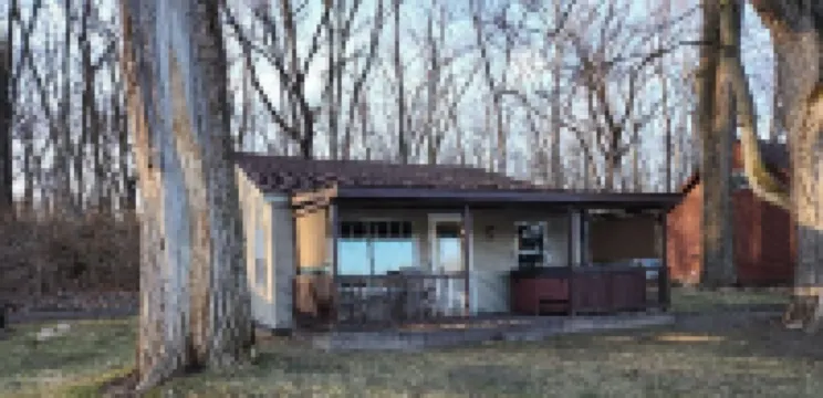 Riverfront Cottage with Hot Tub, Kayaks, Canoes, & Fishing Boats!