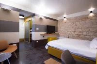 Mijama Suites - سرير ووجبة إفطار