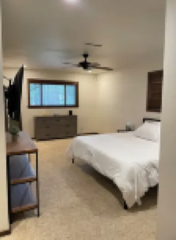 Dog friendly 3-bedroom house in the tall pines close to golf & skiing.