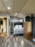 This tiny cabin is a peaceful place complete with stocked pond and kayaks!
