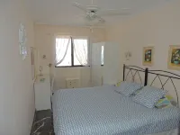 SPECTACULAR SUNNY APARTMENT WITH WIFI, POOL, PANORAMIC CLIFF & SEA VIEWS.