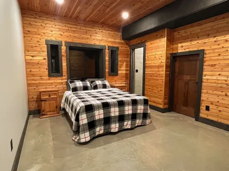 House with bridge, walk around deck, rooftop patio, 24' glass door & much more!!