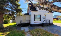 Newly renovated home in the heart of Cochrane close to lake and downtown