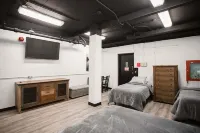 Charming Prohibition-Era Speakeasy Lounge with Bedroom and Commercial Kitchen