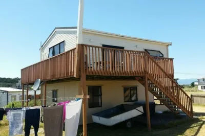 Our beach house! Walk to the beach. Hotels near Manawatu Caravan Club