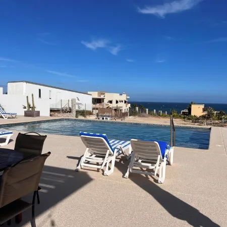 Modern, Clean & Airy Beach Retreat with Pool and Rooftop Ocean Views