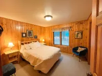 Riverfront Cabin Retreat – Sleeps Up to 18 on the Betsie River