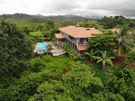 Punta Duarte Garden Inn Отели в г. Мариато