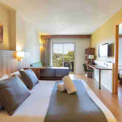 Golden Avenida Family Suites Rooms