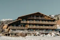 Hôtel les Roches Fleuries Hotel dekat Ferme de l'Aberieux