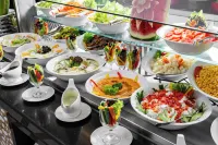 Millennium Al Aqeeq Hotel - 朝食