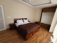 Twin OaksKasauli chowkThe valley viewSun rise on your bed.