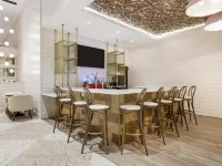 The Banyan Hotel Fort Myers, Tapestry Collection by Hilton Hotels near List Distillery