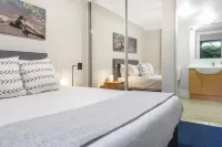 2-Bed Family Haven with Pools, BBQ & Playgrounds