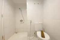 Simple White Accent Studio at Apartment Paltrow City By Travelio