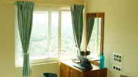 Vasu Inn - Rooms in Valparai - Mountain view