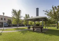 Accogliente appartamento con terrazza e piscina in comune