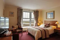 Fitzgeralds Hotel Hoteles en Magheracar