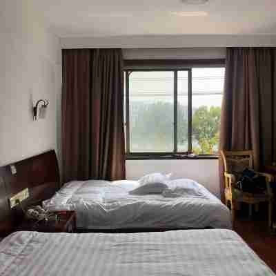 途家房東240212206639公寓（三峯路分店） Rooms